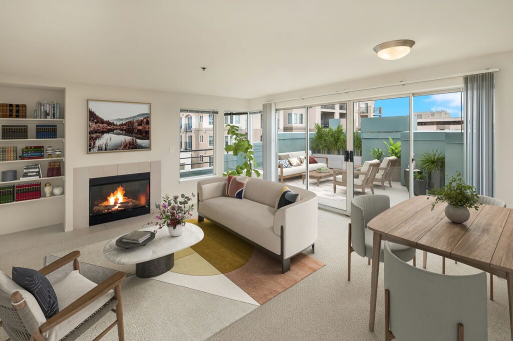 Bright living room with sliding glass doors to ample balcony