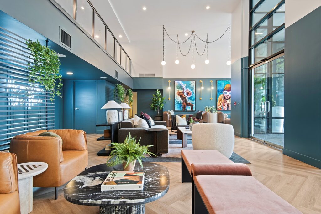 Common area with lounge seating and large windows