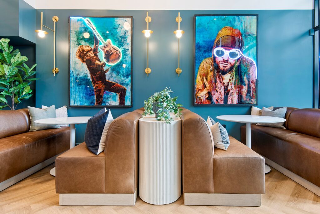 Common area with lounge seating and large windows